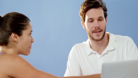 male physiotherapist interacting with patient