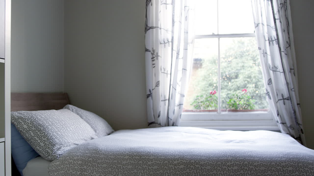 현대적인 세련된 아파트의 침실 지역