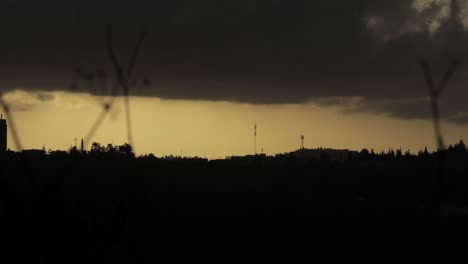 silhouette of jerusalem forest in a cloudy day, time-lapse