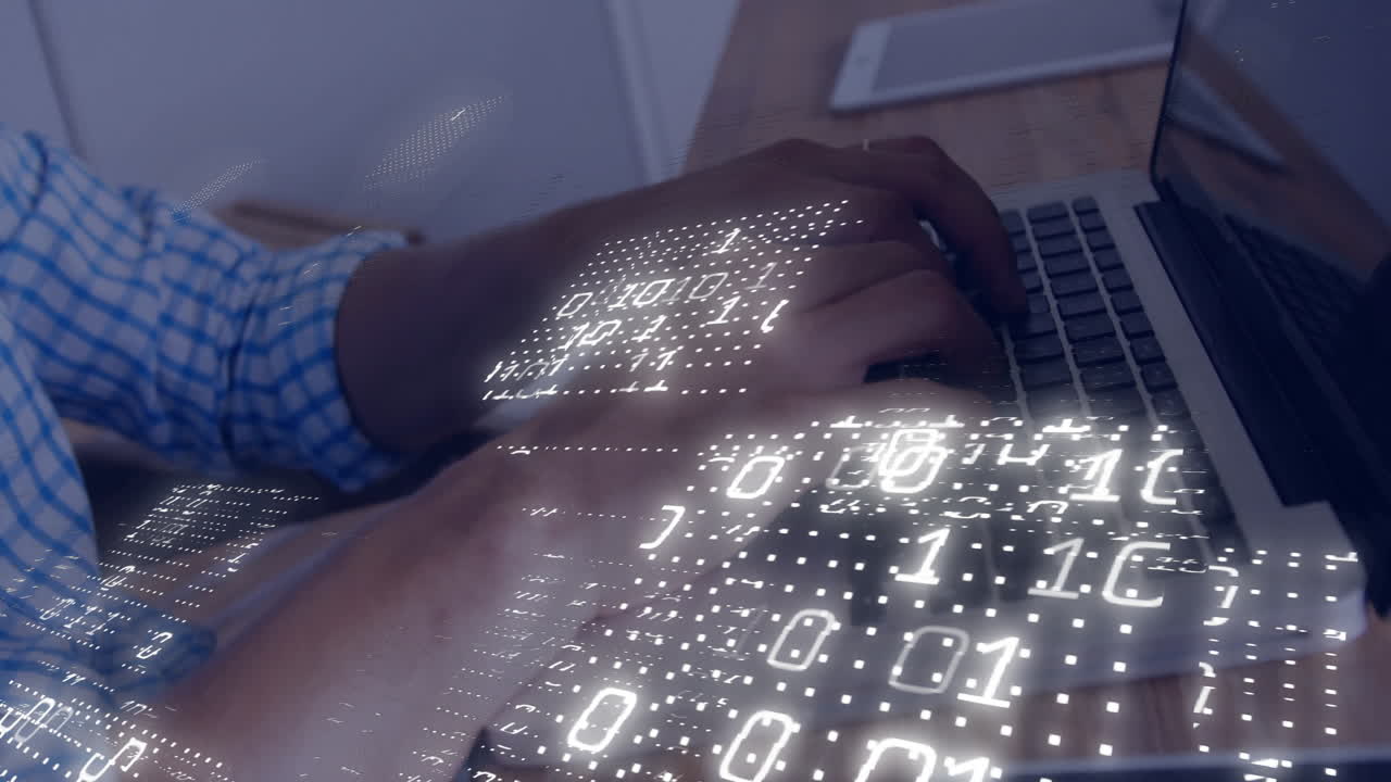 Hands typing on laptop keyboard with binary code animation overlay
