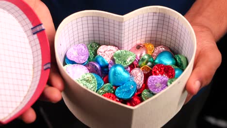 heart-shaped gift box with chocolates