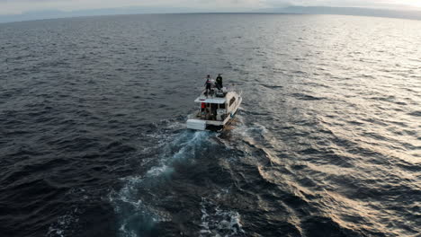 Fishing-Boat-Heading-Out-On-The-Sea-To-Catch-Tuna-Fish-At-Sunrise-In-Croatia