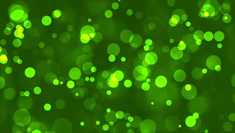 blinking round shapes on green background. abstract background