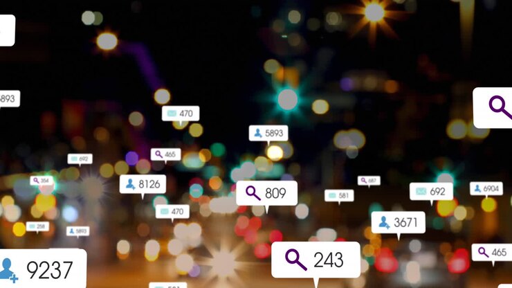 Animazione di icone di social media su una vista sfocata del traffico notturno della città