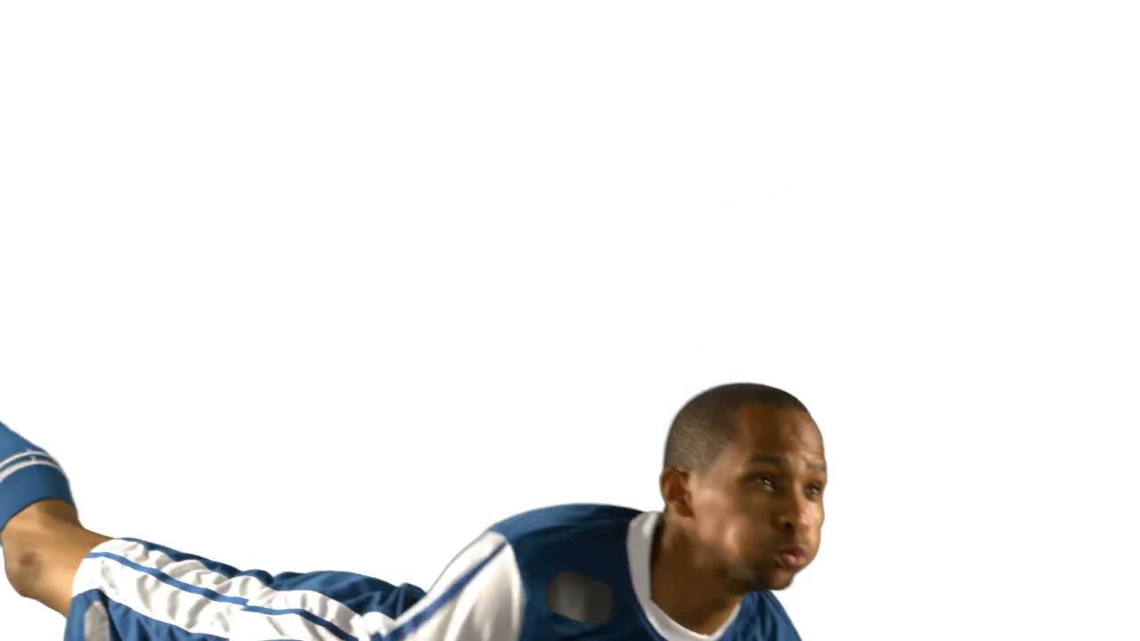 Football player heading the ball