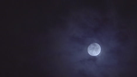 the near moon is beautiful in the night sky, taken from a distance.