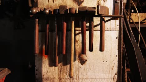 various hammers at workshop