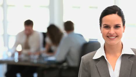 businesswoman smiling at the camera