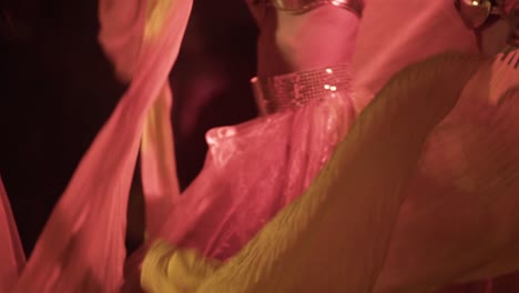 girls dancers dancing joyfully with yellow skirts at cuba, exotic dancers close up