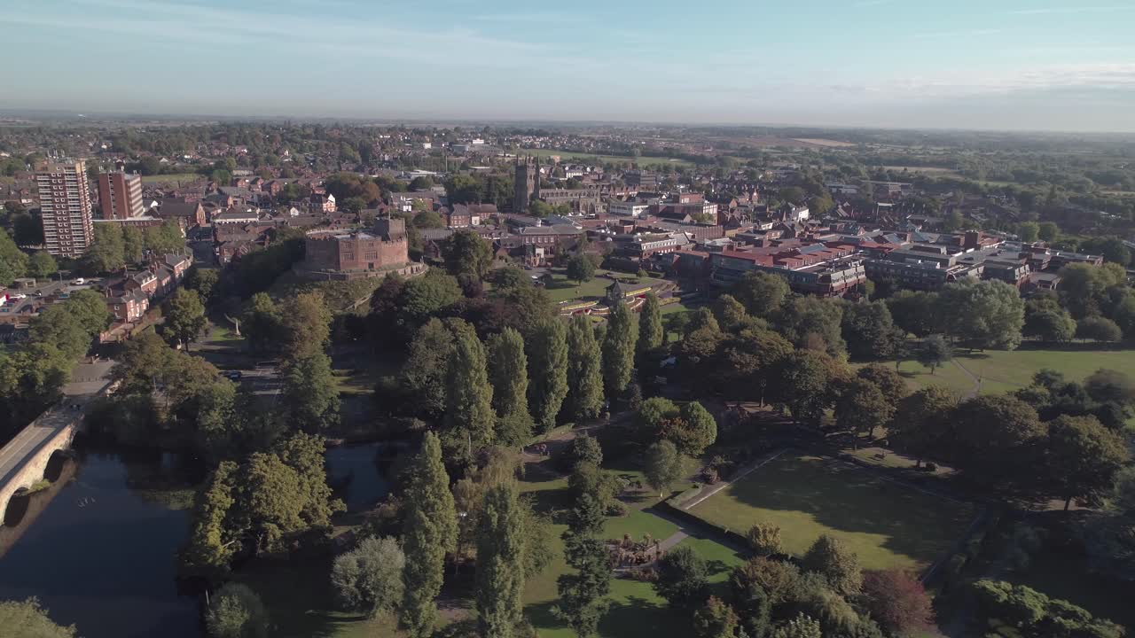 Aerial pan of Tamworth, West to East, above the river Tame looking towards Tamworth Castle