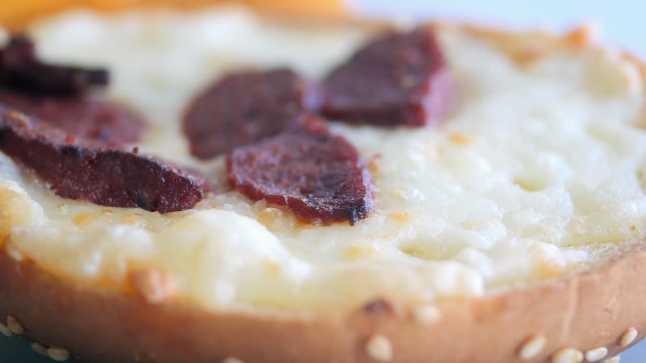 Close-up of a delicious cheese and sausage roll