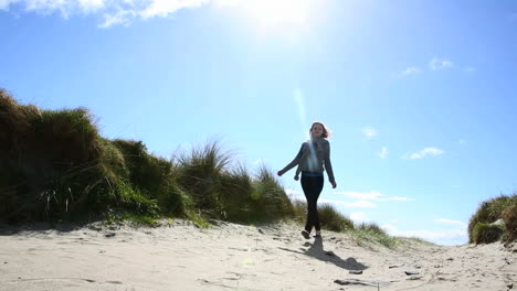pretty woman walking on the beach