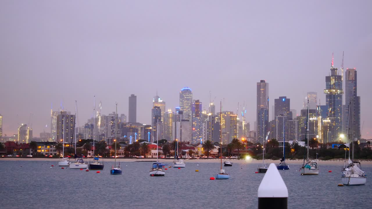 melbourne cbd día a noche timelapse desde el muelle de st kilda - playa