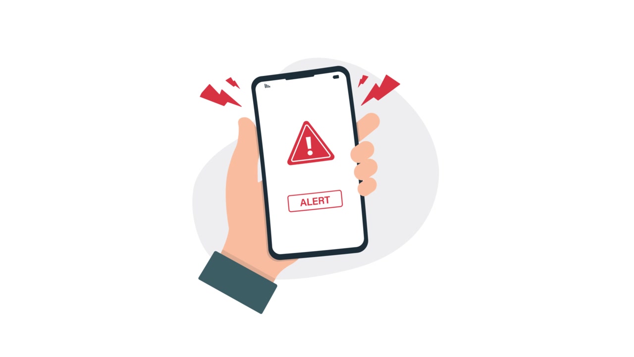 Hand Holding Smartphone Displaying Alert Notification