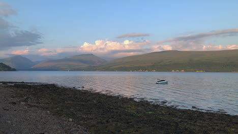 scenic view of mountains and loch fyne with boat adrift from inveraray in argyll and bute, scotland