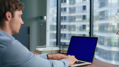 Closeup businessman using chroma key laptop. Boss working mockup screen computer
