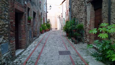 first-person strolling through ancient hamlet of penna in teverina