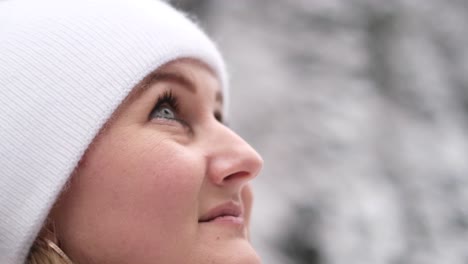 The Face of a Beautiful Girl in Slow Motion Looking at the Sky the Face of a Beautiful Girl in Slow Motion Looking at the Sky Girl in Winter Forest Close up