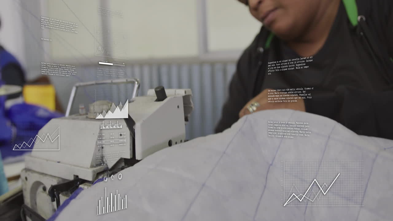 woman guiding quilted fabric under sewing machine in fashion tech workshop, displaying data charts