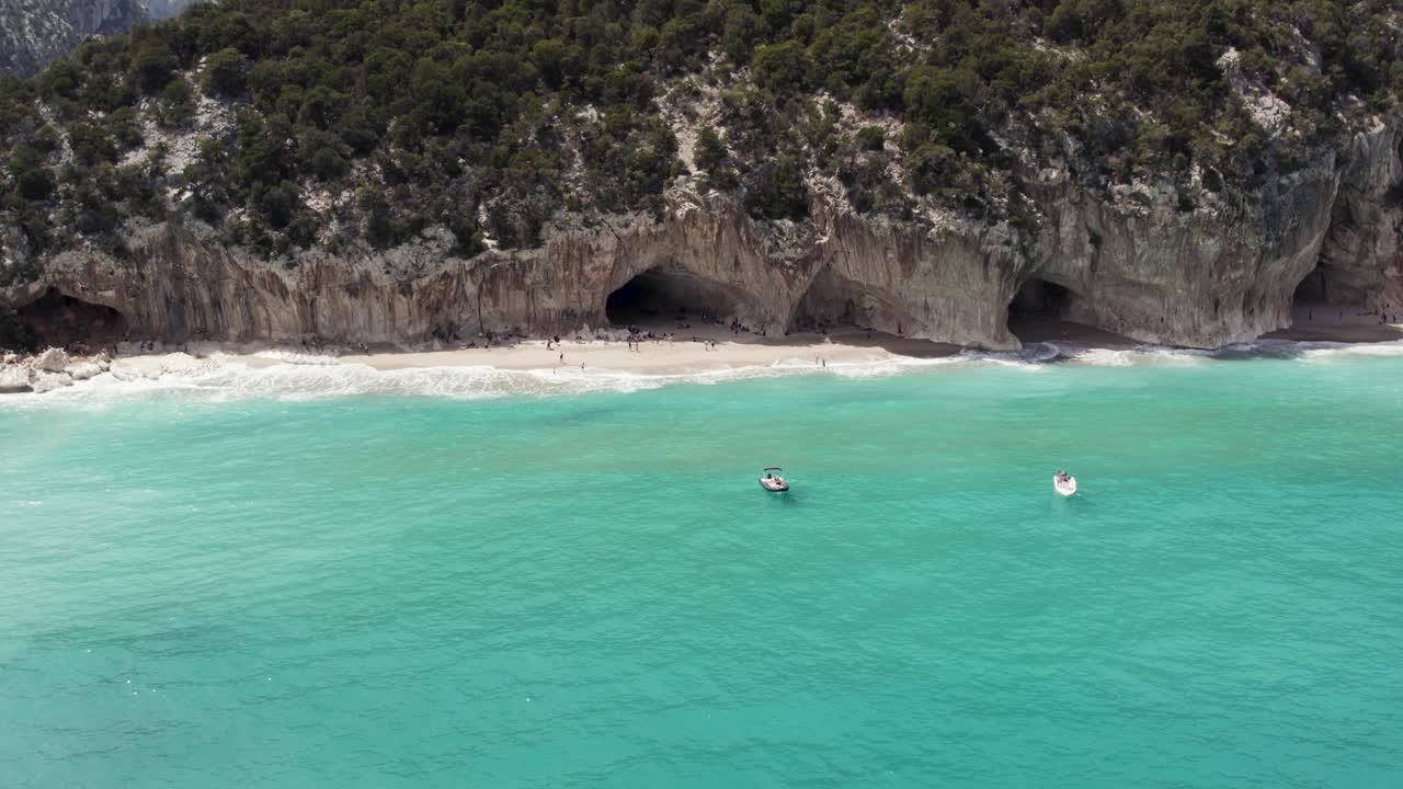 Stunning Turquoise Beach with Coastal Cliffs and Caves
