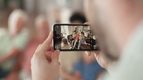 phone, screen and hands for family picture