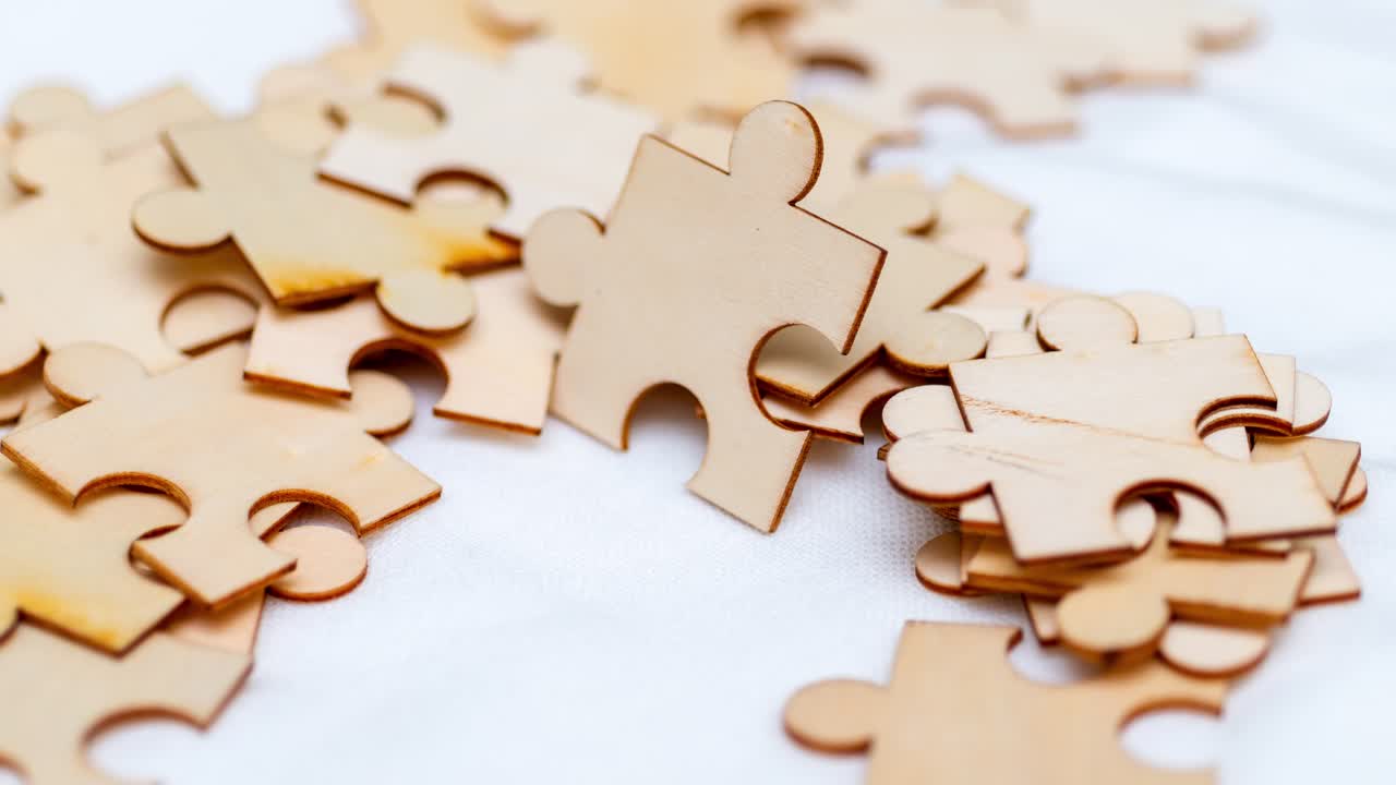 Puzzle pieces zooming together creative space artwork minimalist environment close-up perspective