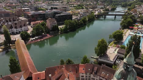 aerial view of olten, switzerland, featuring the clock tower, covered bridge, and river aare