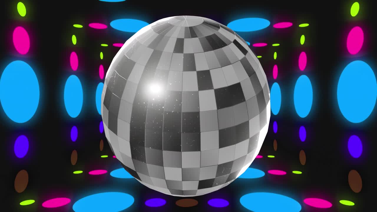 animación de una pelota de discoteca sobre manchas coloridas sobre un fondo negro