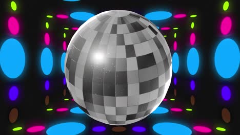 Animation-of-disco-ball-over-colorful-spots-on-black-background