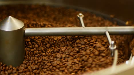 Coffee-beans-poured-inside-coffee-roasting-machine