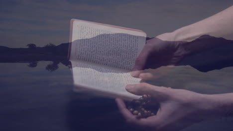 holding open book and beads over serene lake, person appreciating nature animation