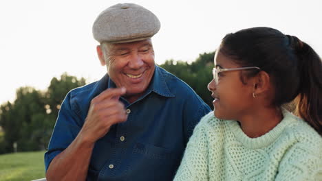 sunrise, grandfather and girl talking in park