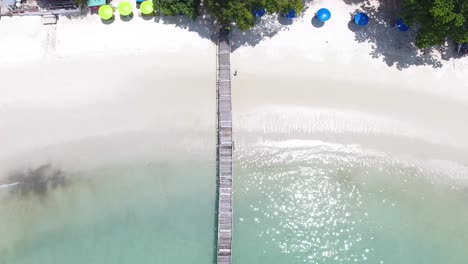 Wooden-bridge-on-a-beautiful-beach-in-Thailand