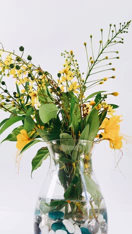 yellow flowers in a vase