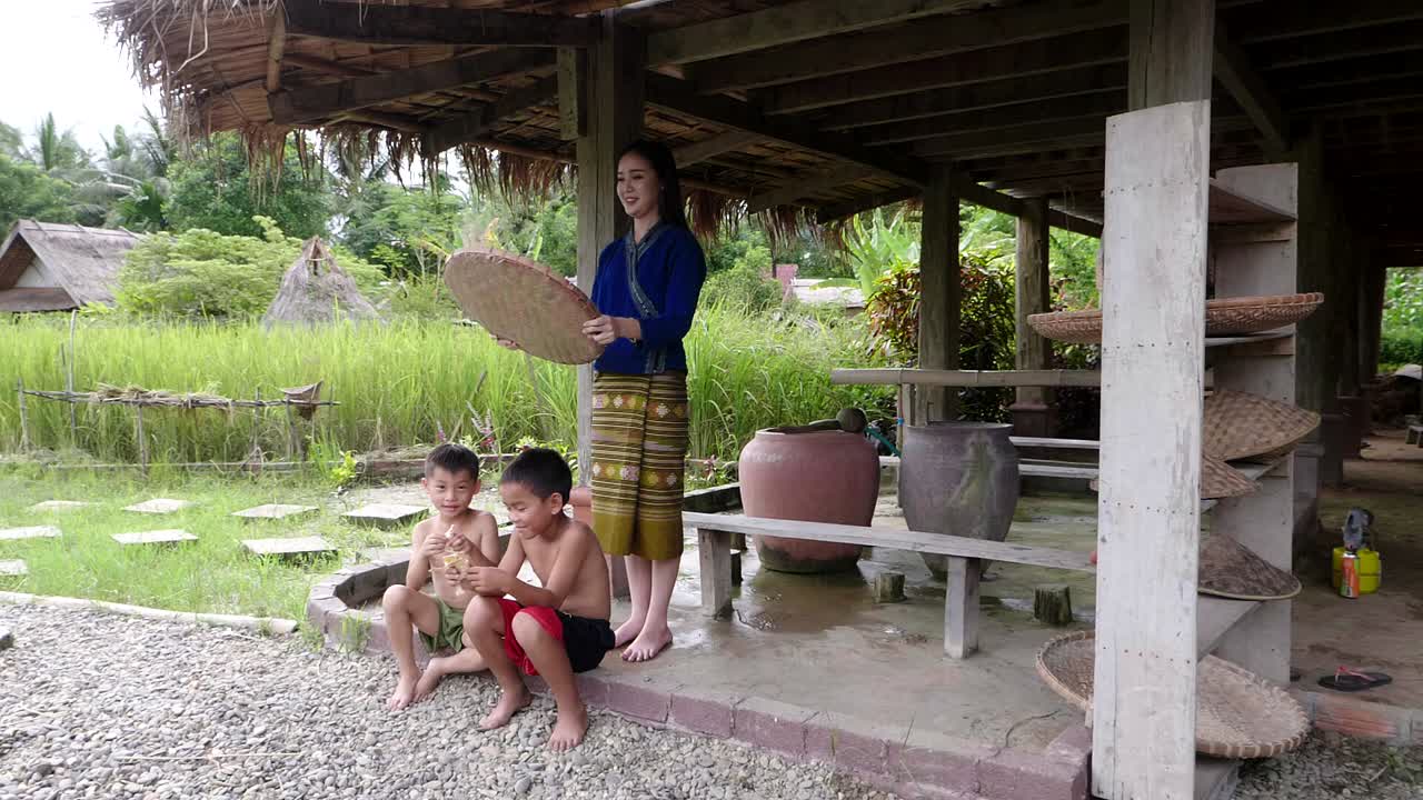 Asian Family at their Rural Home