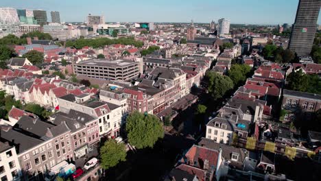 Flying-Above-Utrecht-Netherlands-Historic-City-Center,-Drone-Aerial-View-of-Buildings,-Streets-and-Dom-Tower