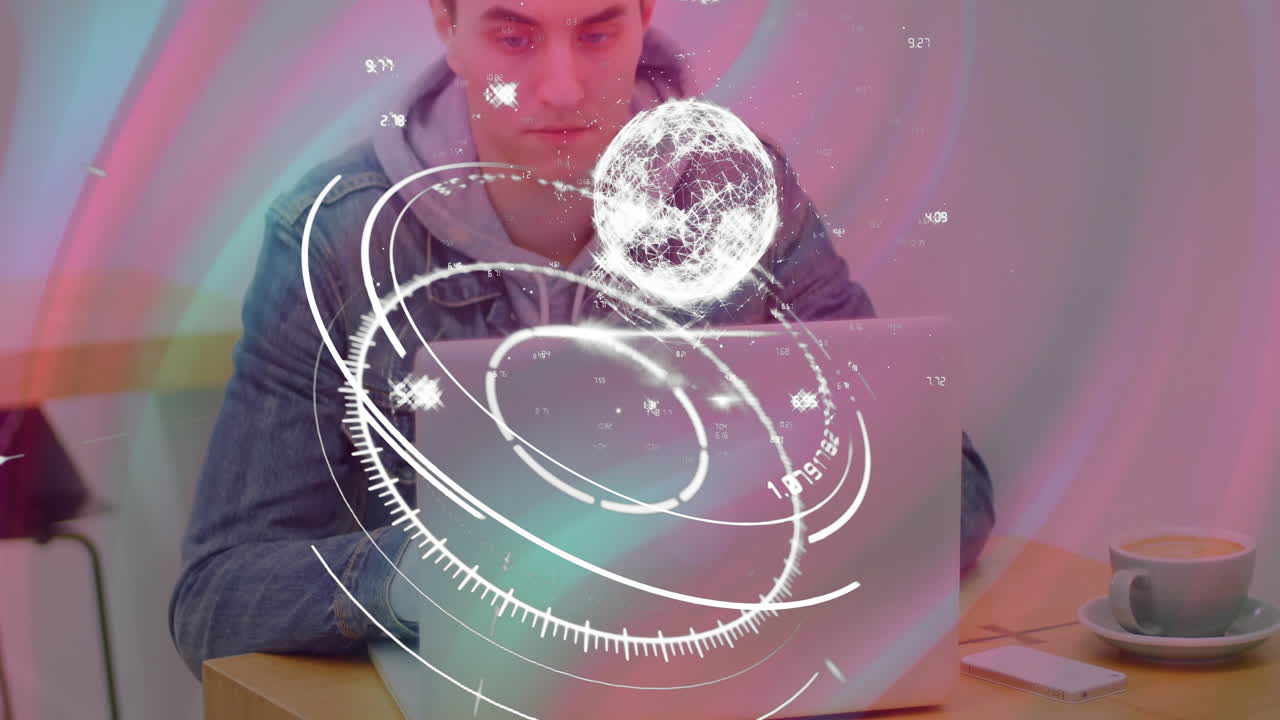 man working on laptop with smartphone and coffee, exploring tech interfaces with holographic globe