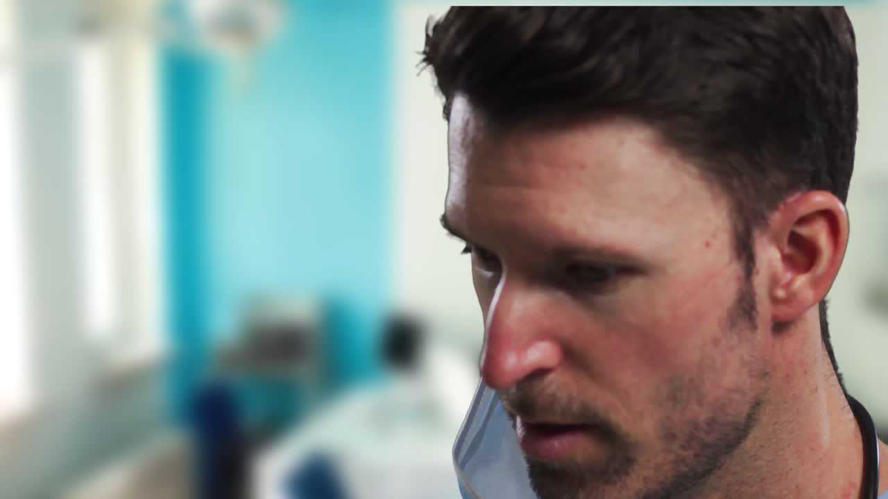 Alone businessman smiling against yellow and geometrical background