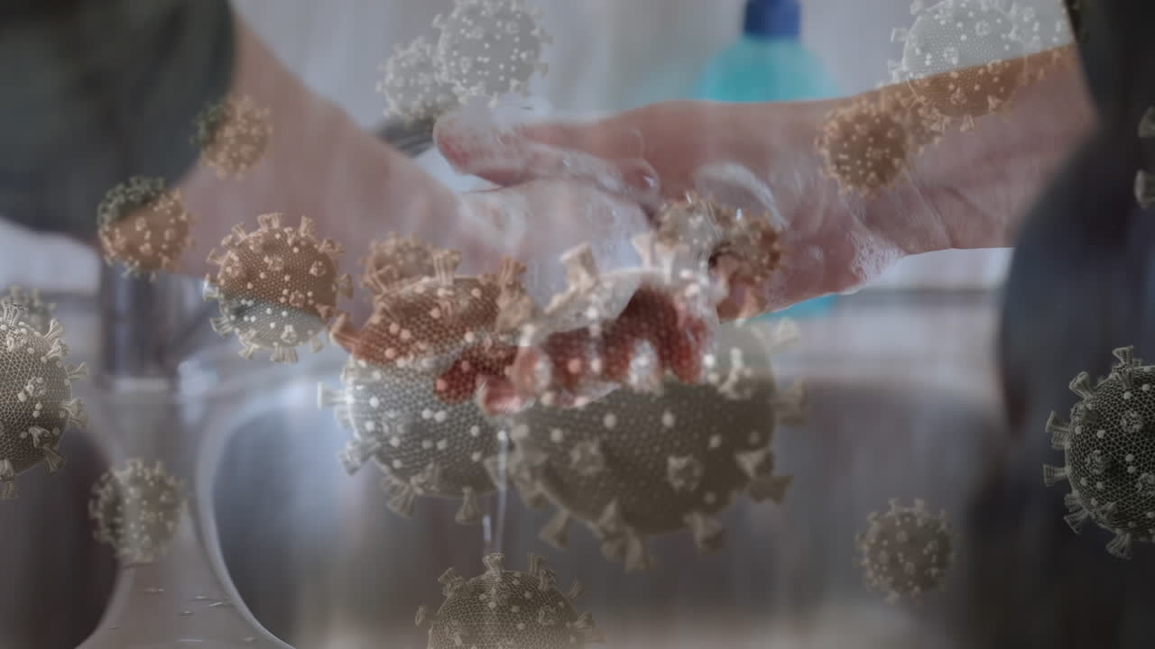 손을  ⁇ 는 사람 위의 코로나 19 세포의 애니메이션