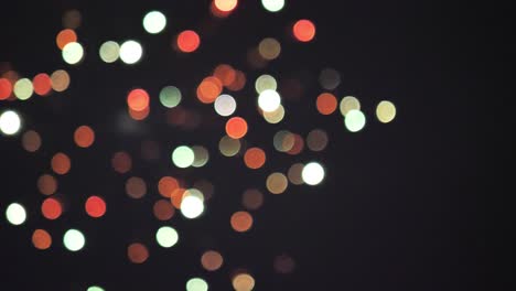 60-frames-per-second-shot-of-fireworks-exploding-in-the-air-creating-colorful-bokeh-bubbles-on-the-4th-of-July