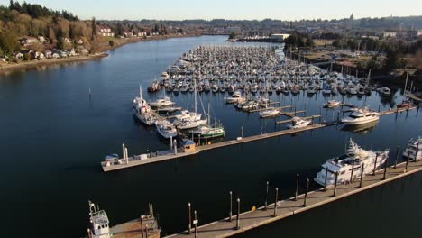 flying over a marina at sunset in olympia washington on the puget sound