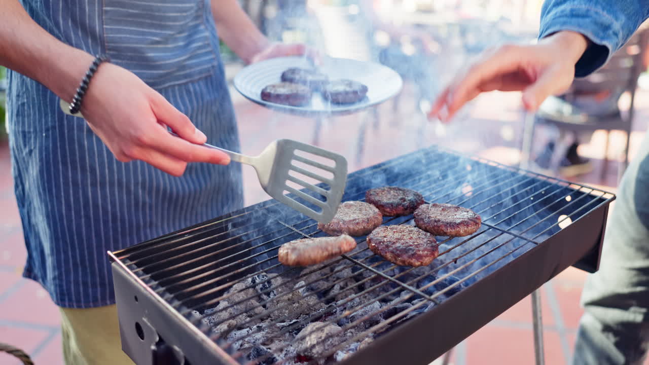 People grilling burgers on a barbecue