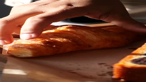 croissant on a wooden tray