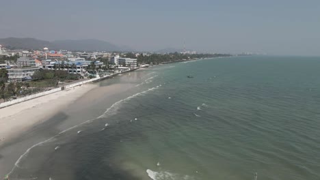 fishing boats stowed safely behind breakwater at hua hin, thailand