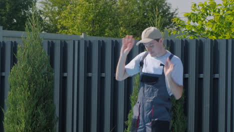 man dancing in a yard