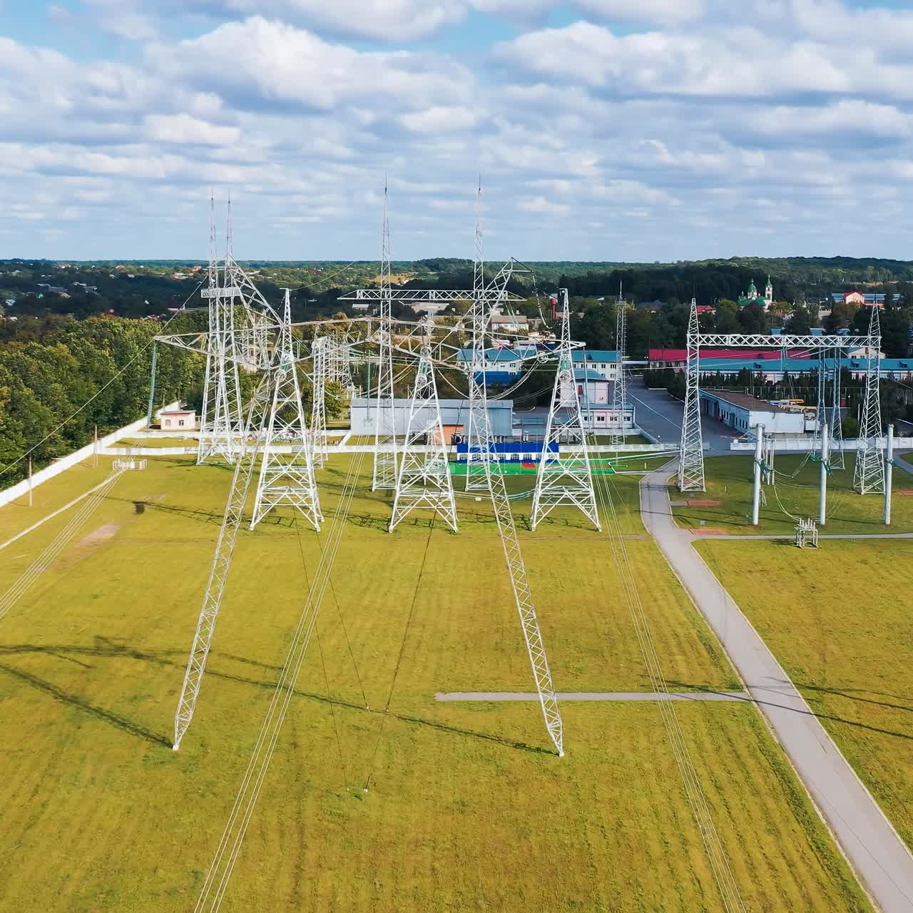 High voltage tower electricity station. Aerial view of electrical voltage wires