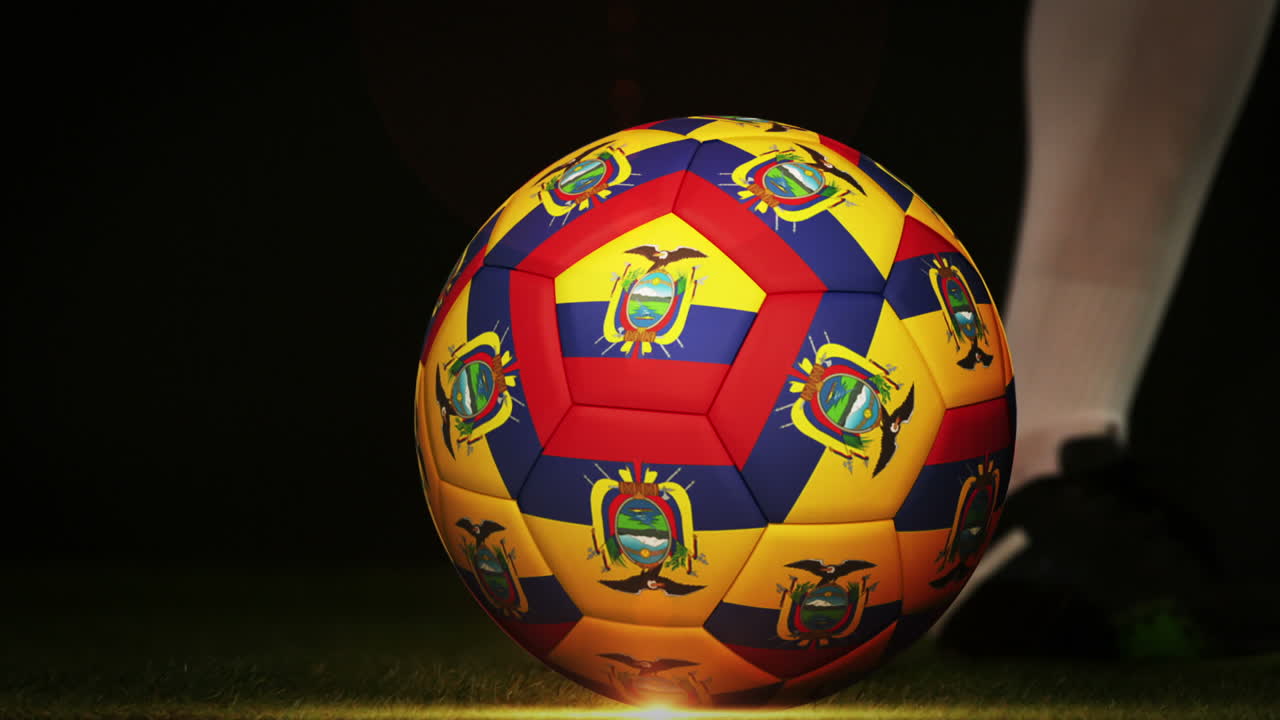 jugador de fútbol pateando la pelota de la bandera de ecuador