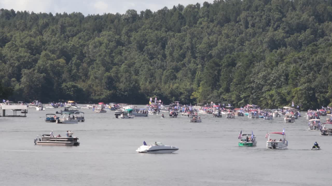 Boats decorated to support USA Trump Pence 2020. Hundreds of boats came out for the Trump 2020 boat parade on Lake Hamilton in Hot Springs.