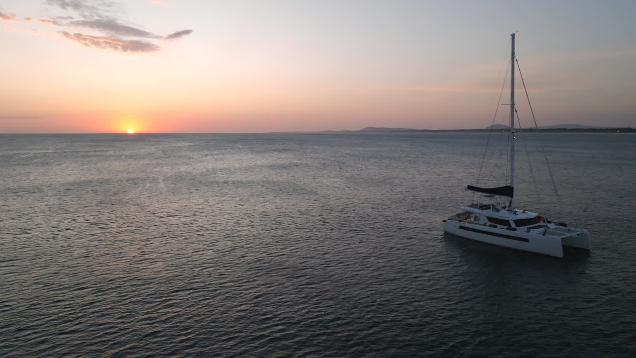 Embark on a unique sunset journey as a catamaran sails along Punta del Este's coast, Uruguay