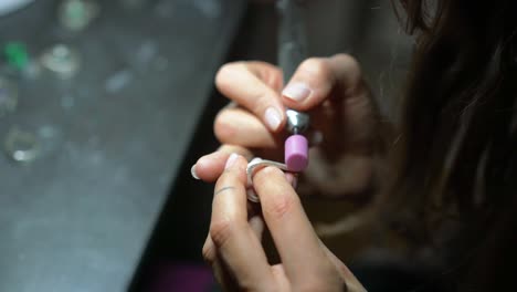 jewelry making: polishing a silver ring